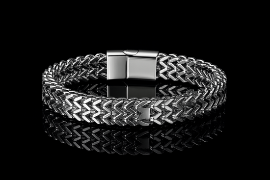 Multiple angles of the silver bracelet on black shiny table
