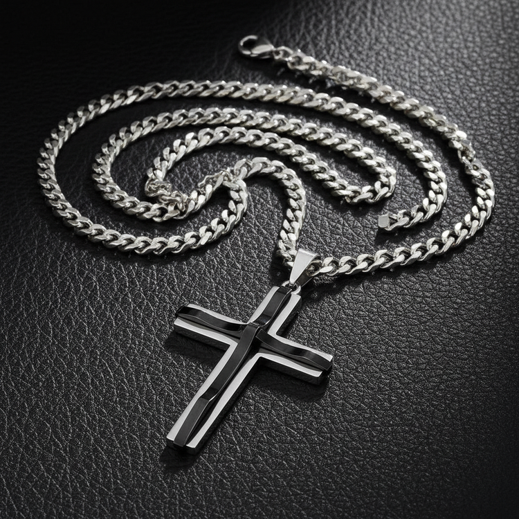 Silver and black cross necklace on black leather