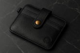 Black wallet with bright, clear lighting