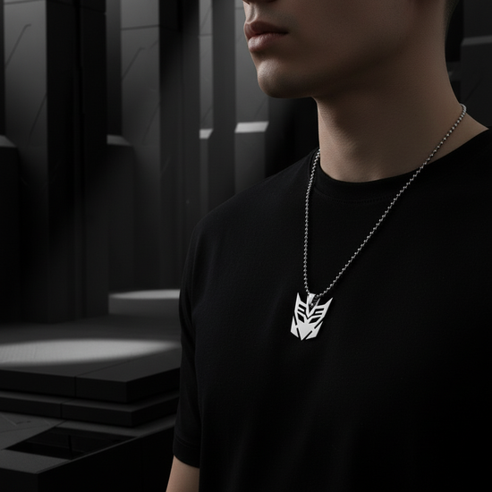 Decepticon necklace being worn with dark geometric background