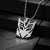 Extreme close-up macro of Decepticon necklace