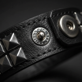 Extreme close-up of studded bracelet