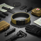 Flat lay composition with tan tactical belt and accessories