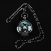 Flat lay dark raven skull watch