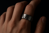 Gothic ring being worn on someone&