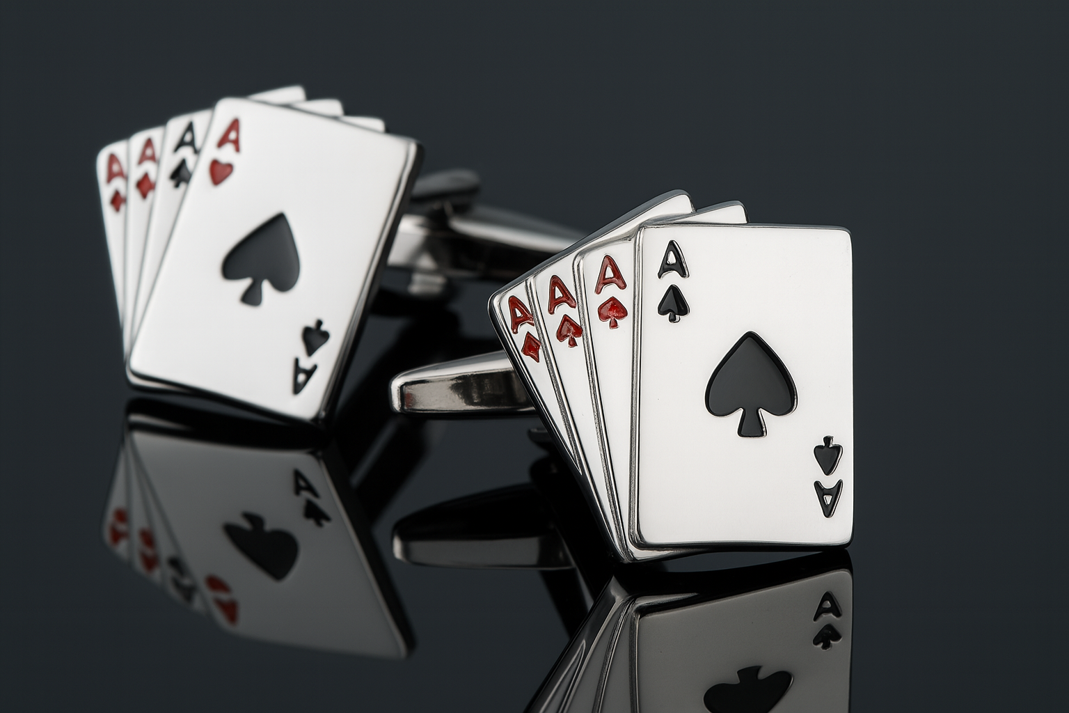 Playing card cufflinks from multiple angles on reflective surface