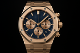 Professional multi-angle shots of rose gold watch with blue dial