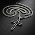 Silver and black cross necklace on black leather