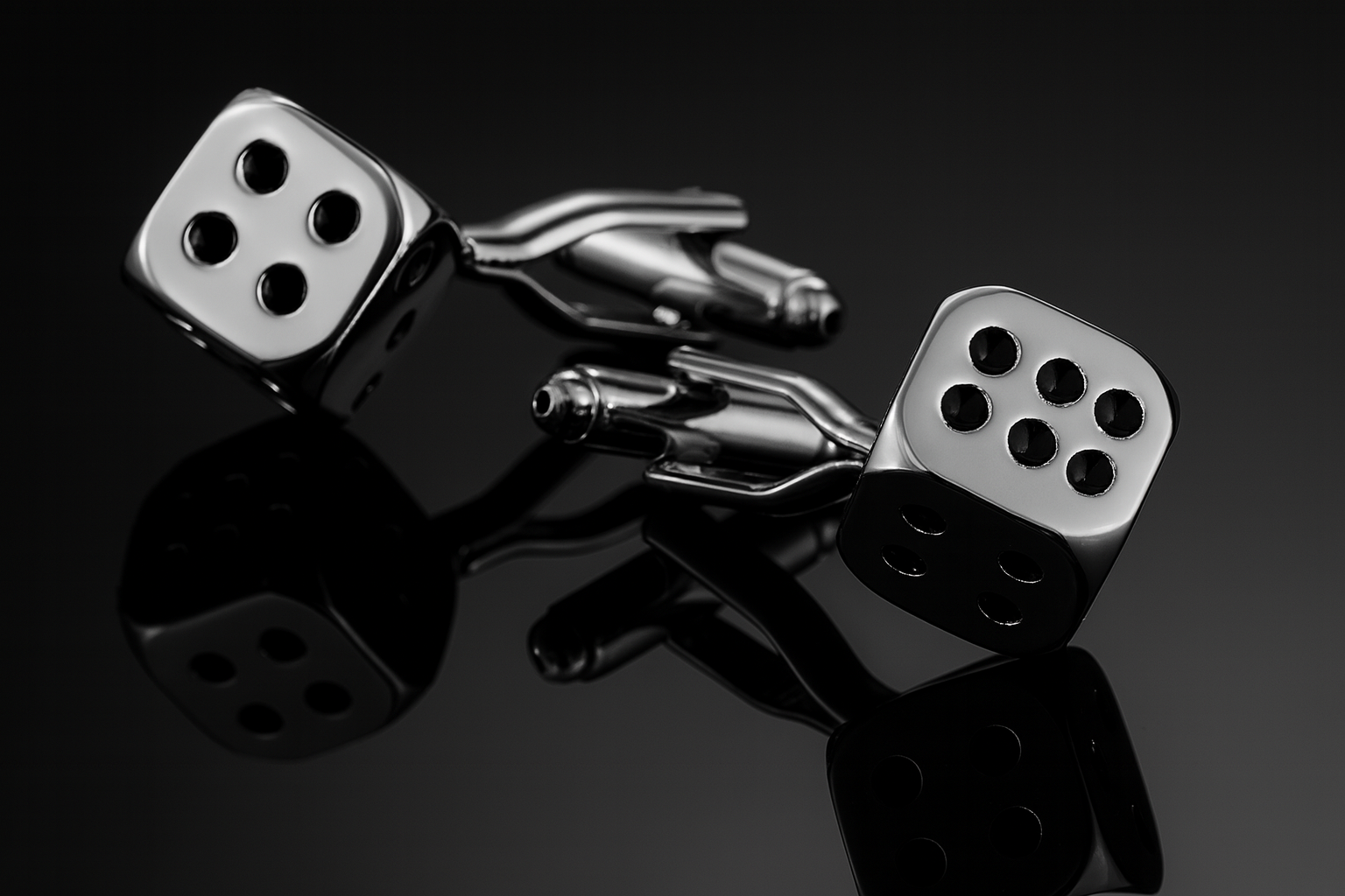Silver dice cufflinks dramatic low angle perspective