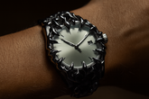 Silver gothic spike watch worn - close-up detail