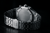 Silver watch back with silver screws