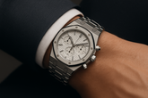 Silver watch on wrist lifestyle images