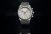 Silver watch with white dial - dramatic reflection