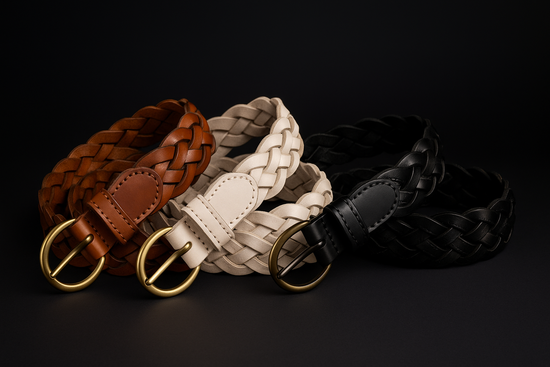 Three vintage braided cowhide belts collection in brown, beige, and black