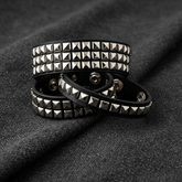 Various bracelet sizes on charcoal fabric