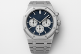Watch with geometric textured dial background