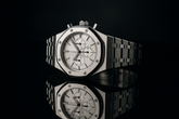 White dial watch side profile with reflection