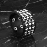 Wide bracelet on black marble