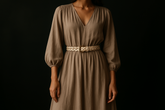 Woman styling vintage braided beige leather belt